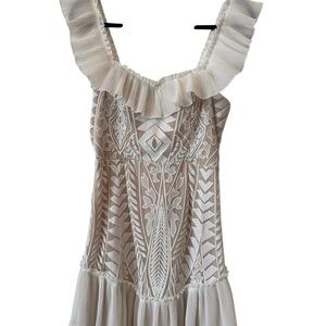 Saints + Secrets  Hope lace mini dress‎ in white ruffle details. Perfect Bridal